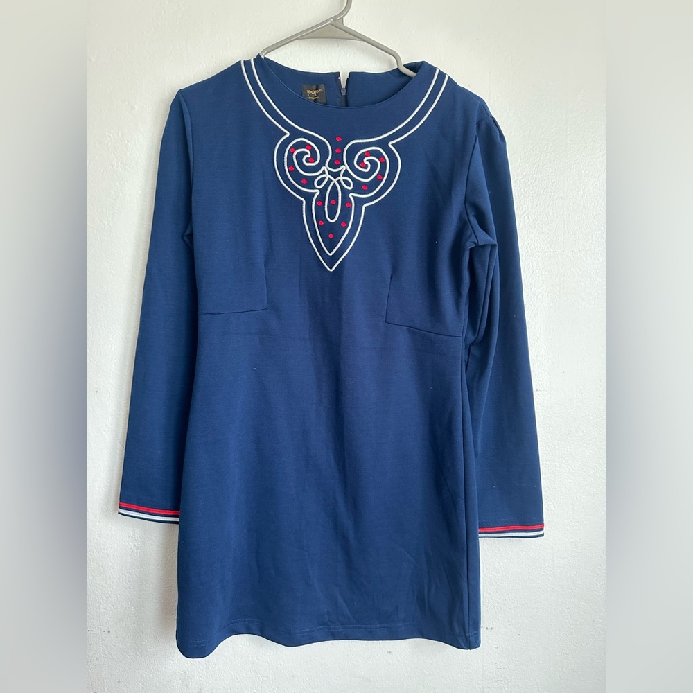 pop Navy dress with White Embroidery and Red Accents